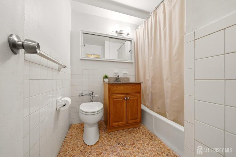 Photo 14 of 1874 Pelham Pkwy S, New York City NY 10461, New York City, NY